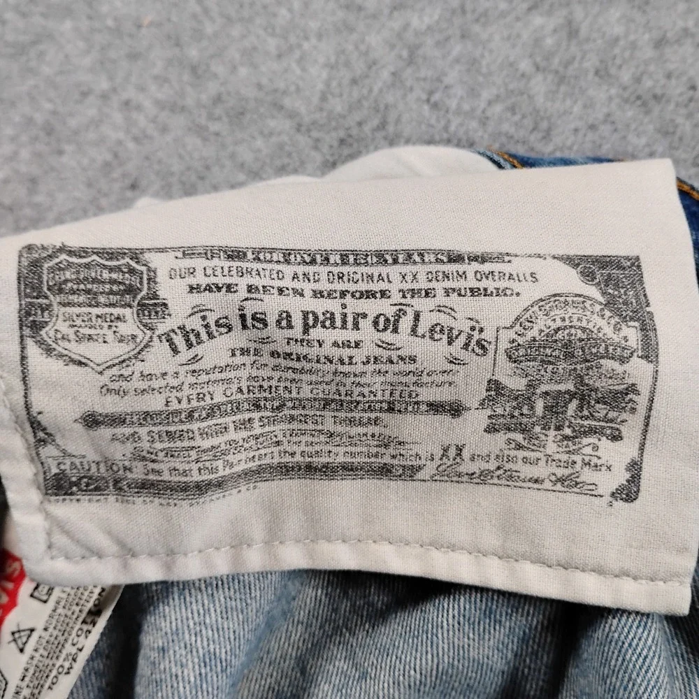 Vintage Levis 501 Mens Light Wash Blue Straight Leg Button Fly Denim Jeans 34x28